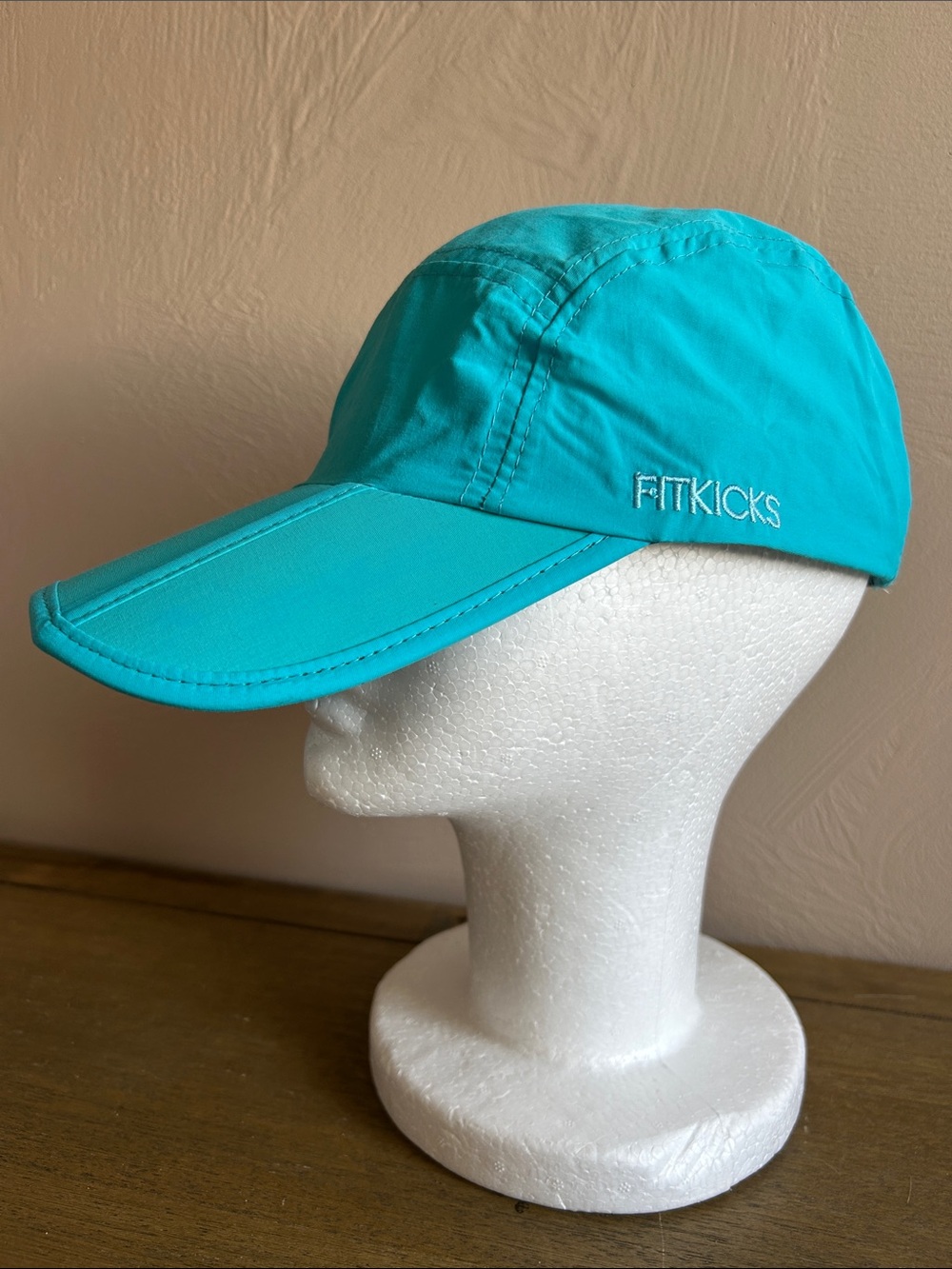 Fitkicks Folding Caps Turquoise. 100% Polyester Offering UPF 50+ UV. Adjustable.